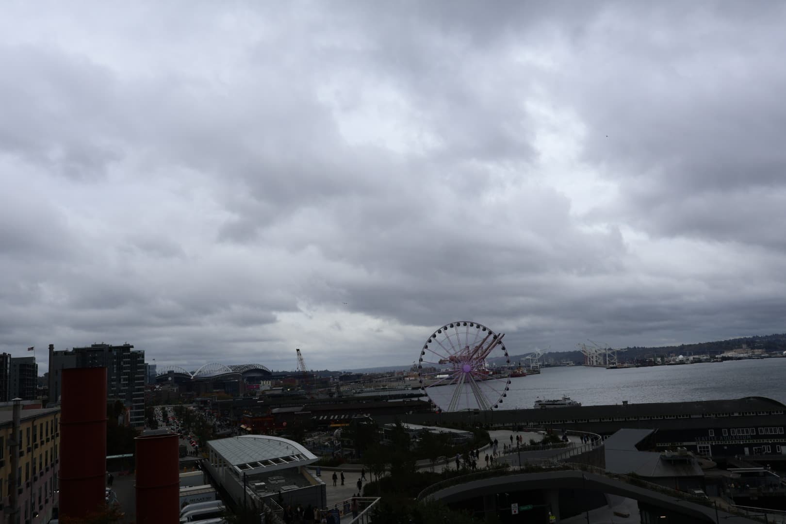 Seattle waterfront panorama with Great Wheel and dramatic clouds